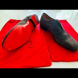 Christian Louboutin
Men's Suede Red Sole Loafers